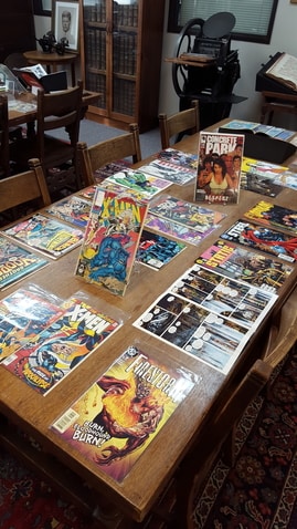 table with comics